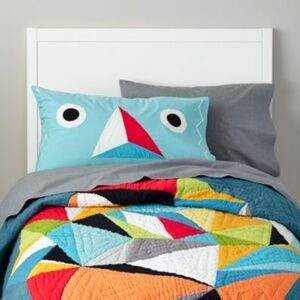 The Land of Nod Meteorite quilt and reversible pillow case. Andrew Bannecker